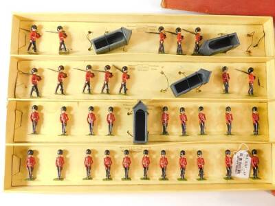 Britains 155 The Changing of the Guard at Buckingham Palace, a collection of painted lead soldiers of the Coldstream guards band and marching guard, Scott's guards, four sentry boxes, in original two tier illustrated labelled display box, one sentry box a - 5