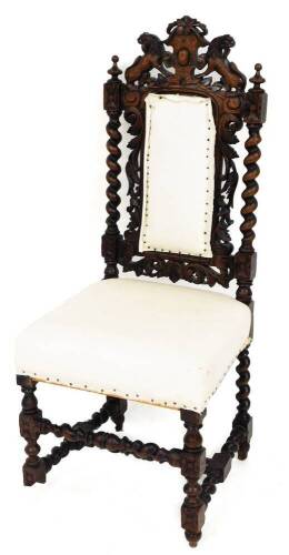 A late 19thC hall chair, with barleytwist and scroll leaf carved back and lion mask top, on barleytwist legs, 107cm high, 44cm deep.