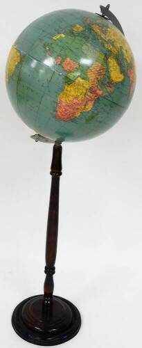 An early 20thC terrestrial globe on stand, the paper moulded globe, on steel apex, on a turned mahogany column on circular base, 100cm high.