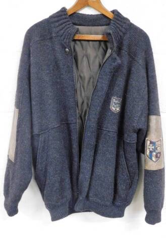 A designer woollen zipped jacket, with quilted lining and pilots badge to exterior and arms, size 50.