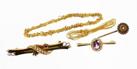 A small group of gold and other jewellery, comprising a 9ct gold and amethyst set bar brooch, with rope twist borders, 3cm wide, a Victorian 15ct gold bar brooch, set with sapphires and seed pearls, 5cm wide, and a gold stick pin top, 5.6g all in, along w