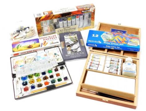 A Winsor & Newton mahogany finish artist's box, with printed lid and inner label, with fitted sections, 23cm wide, various paints, pastels, other artist related materials, etc. (a quantity)