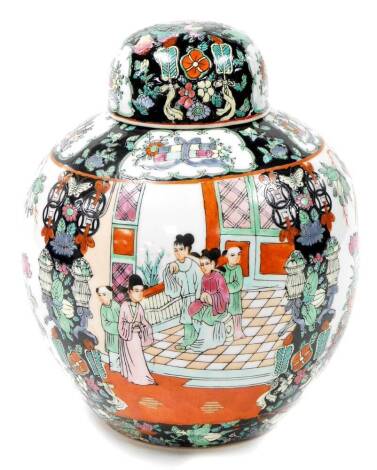 A Chinese porcelain ginger jar and cover, bearing figures, animals and flowers, on black and white ground, unmarked, 28cm high.