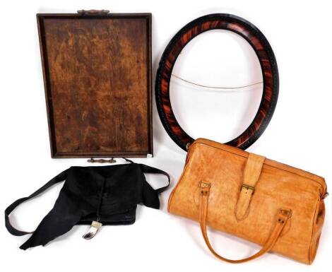 A Gladstone type tan leather bag, with strap, a leather shoulder bag, a maple frame and an oak serving tray. (4)