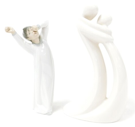 Two 20thC Lladro figures, comprising one of a child in flowing robes yawning, printed marks beneath, 23cm high, The Circle of Love figure Love 335487, printed marks beneath. (2)