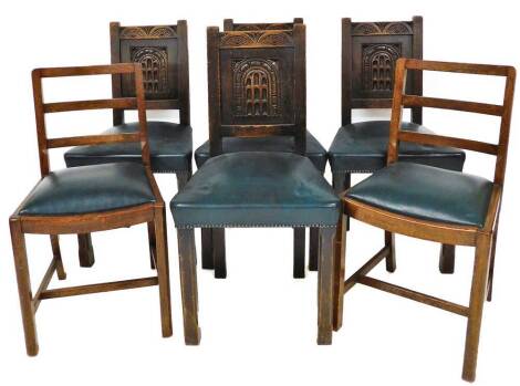 A set of late 19thC oak dining chairs, each with shield carved back, on blue faux leather seats, with button pins (4), together with two matched side chairs, with oak ladder backs. (6)