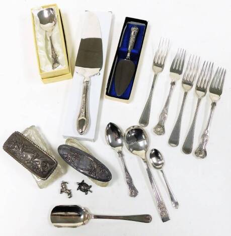 Two silver topped dressing table jars, one of rectangular form, bearing the initials DM, the other of oval form, with cut glass bases, together with a selection of silver plated cutlery. (1 tray) N.B. This lot is sold on behalf of the Rotary Club of Gran