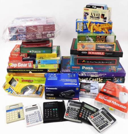 Various toys and games, to include Better Golf DVD gift set, Soccer Super Skills, Scrabble, Jenga, Uno, Top Gear Christmas jigsaws, Panasonic camcorder, calculators, etc. (a quantity) N.B. This lot is sold on behalf of the Rotary Club of Grantham.