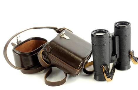 A pair of Carl Zeiss Dialyt 8x30 B binoculars, in a brown leather case, the binoculars 11.5cm high.