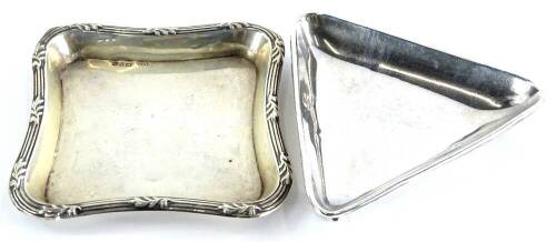 Two early 20thC pin trays, one of triangular form, the other square with a reeded border, 1½oz overall.