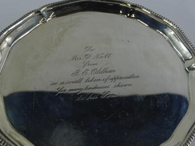 A George VI Mappin and Webb silver card tray or waiter, with a gadrooned and moulded, engraved centrally to Mr F. Nott from J.E. Oldham as a small token of appreciation for many kindness to his son, Sheffield 1947, 4¾ oz, 15cm diameter. - 2