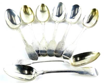 A collection of eight silver fiddle pattern tablespoons, various dates, engraved, 17¼oz.