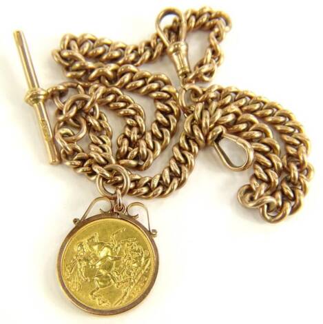 A George V full gold sovereign and 9ct gold watch chain, the sovereign dated 1913 in 9ct gold pendant mount, on a curb link watch chain, with two clips and t-bar, marked 375, 25cm high, the necklace 38cm long overall, 62.2g all in.