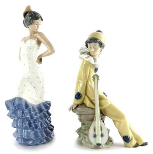 Two Nao porcelain figurines, Flamenco, model 02000418, issued 1992, 24cm high, and Wandering Minstrel, model no 02001054, issued 1992, 19cm high.