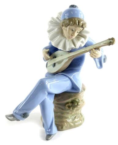 A Nao figure of a Pierrot musician.