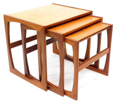 A G-Plan teak nest of three tables, on end supports, 53cm wide.