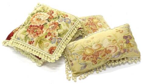 A pair of Aubusson type cushions, each in tassels, and two similar. (4)