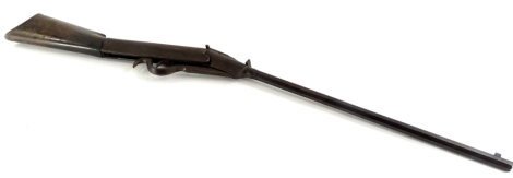 An early 20thC break action air rifle, with walnut stock, unmarked, possibly BSA, 105cm long.