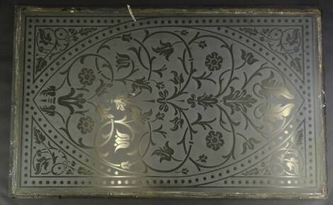 A late Victorian frosted glass panel, decorated with leaf and flower motifs, 101cm high, 62cm wide.