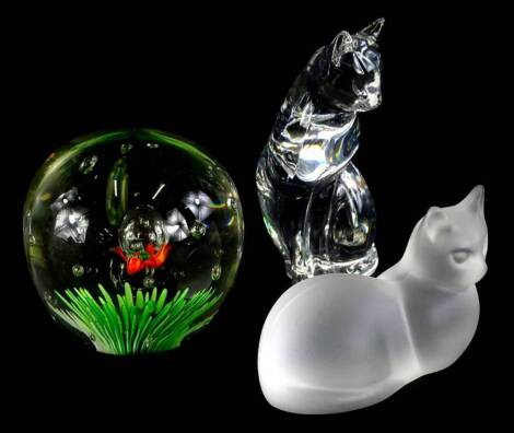 A Lenox crystal glass seated cat, dated 1993, a Lenox matt finish glass seated cat, and a glass paperweight (3).