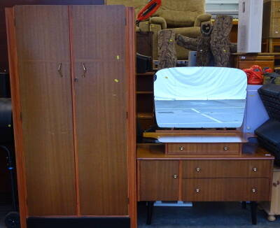 A teak mirror backed dressing table and a double wardrobe, painted cupboard, a storage box, a Sovereign hedge trimmer, an AA car badge, Meccano and a tin etc.