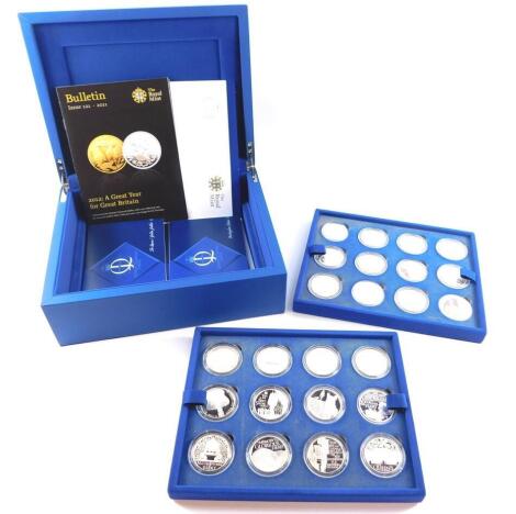 A Royal Mint The Queen's Diamond Jubilee Coin Collection, containing twenty four silver proof crowns, with certificates, cased and outer boxed.