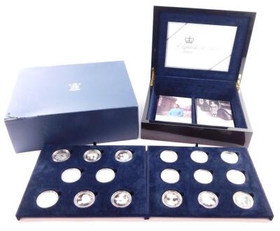 A Royal Mint Eightieth Birthday Silver Proof Coin Collection 2006, for H M Queen Elizabeth II, sixteen crowns in two trays, cased and boxed, with certificate.