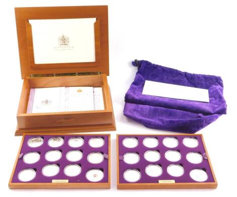 A Royal Mint Queen Elizabeth II Golden Jubilee Collection, twenty four coins in two trays, boxed with protective bag, with certificate.