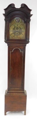 A Georgian oak cased longcase clock by Gamwel of Alford, the brass break arch dial with rococo scroll spandrels, chapter ring bearing Roman and Arabic numerals, subsidiary seconds and date dials, beneath a Tempus fugit circular aperture, painted with a wi - 2