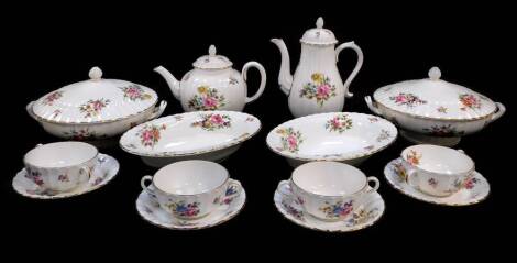 A group of Royal Worcester porcelain decorated in the Roanoke pattern, Z2827, comprising of a pair of vegetable tureens and covers, pair of oval serving dishes, four soup cups and saucers, teapot and coffee pot.