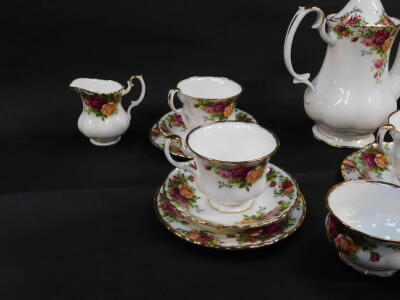 A Royal Albert porcelain part tea and coffee service, decorated in the Old Country Roses pattern, some seconds, comprising coffee pot, two cream jugs, sugar bowl, six teacups and saucers, and six tea plates. - 3