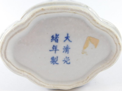 A Chinese blue and white porcelain tea canister and cover, of lobed form, decorated with flowers and scrolling leaves, bears six character mark, 16.5cm high. - 3