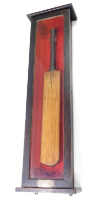 A Stuart Surridge and Company late Victorian cricket bat, patent rapid driver, cased, with presentation plaque "this bat was made from a willow growing thirty yards in front of the club house in October 1899 presented by Stuart Surridge and Company" being