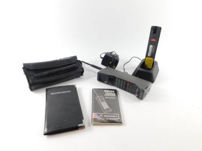 A Motorola Cellular portable telephone, model 8500X, with nickel cadmium battery, charger, bag and user manual, together with an Inter-City mobile communications Vodafone network services and dialling codes booklet, boxed. - 2