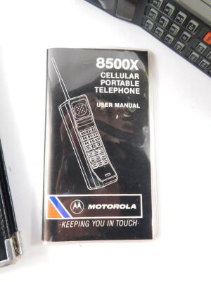 A Motorola Cellular portable telephone, model 8500X, with nickel cadmium battery, charger, bag and user manual, together with an Inter-City mobile communications Vodafone network services and dialling codes booklet, boxed. - 4