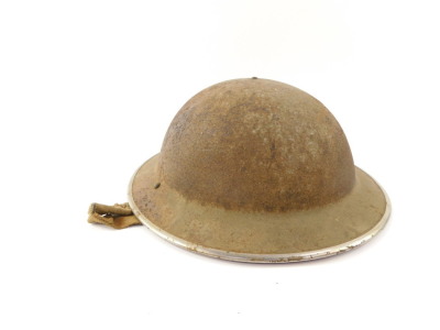 A World War I Brodie helmet, with leather lining and white metal trim, a kukri with damascene decoration, in a leather scabbard, and a Union Jack flag. (3) - 2