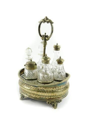 A Victorian silver plated and cut glass six bottle cruet on stand, 30cm high.