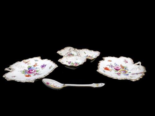 A pair of Grossbaum und Sohne late 19thC porcelain leaf shaped dishes, moulded with insects and painted with sprays of flowers, printed mark, a Dresden porcelain three division entree dish painted with flowers, painted mark, together with a porcelain spoo