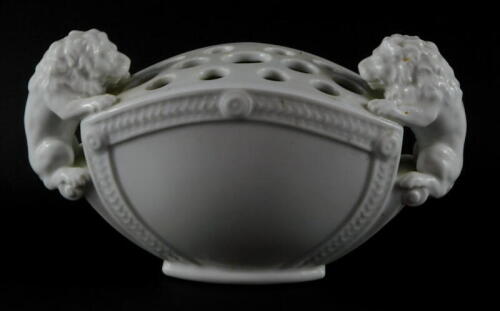 A Royal Copenhagen white glazed floral Bouquetiere, with twin lion handles, No 1571, printed and incised marks, 23cm wide.