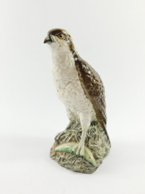 A Beswick Beneagles scotch whiskey decanter, modelled as an osprey, designed by D Lyttleton 1977, and a further Beneagles scotch whiskey decanter for Peter Thomson (Perth Limited) modelled as a curling stone. (2) - 5