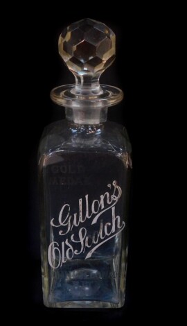 An early 20thC cut glass advertising decanter for Gillon's Old Scotch, gold medal, John Gillon & Co Leith established 1817, 26cm high.