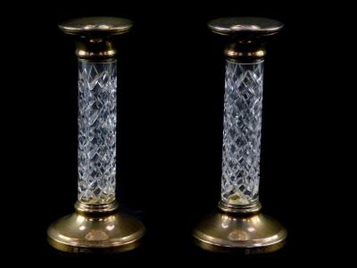 A pair of cut glass and silver loaded candlesticks, Barker Ellis Silver Company, Birmingham 1992.