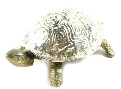 A brass and silver plated clockwork driven bell moulded as a tortoise, by A Barrett and Sons, 63 and 64 Piccadilly, London, 14cm wide.