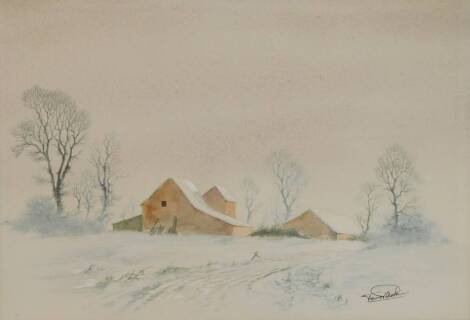 Trevor Rankin (British, 20thC). Farm buildings in a snowy landscape, watercolour, singed, 24cm x 36cm.