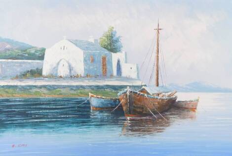 B.Ilias (Continental, 20thC). Greek coastal scene with fishing boats and a church, oil on canvas board, signed, 60cm x 90cm.