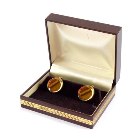 A pair of 9ct gold and tiger's eye cufflinks, 11.3g all in.