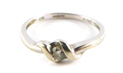 A 9ct gold and diamond ring, in a crossover design, size M, 1.7g all in.