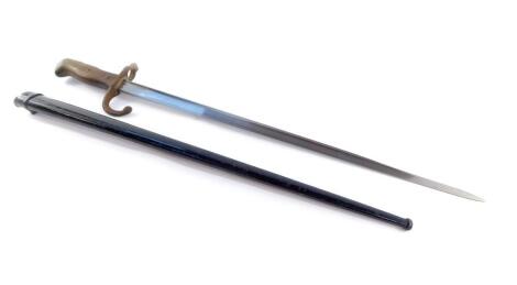 A 1878 Saint-Etienne bayonet, with black metal scabbard.