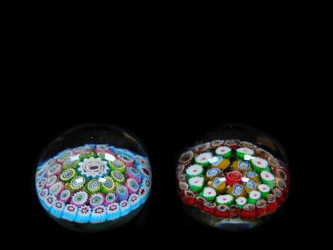 Two glass concentric Millefiori paperweights, 8cm diameter.