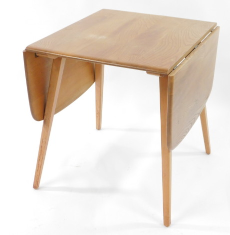 An Ercol model 492 Windsor elm and beech square drop leaf dining table, raised on tapering splayed legs, 71cm high, 60.5cm wide, 135cm extended, 73.5cm deep.